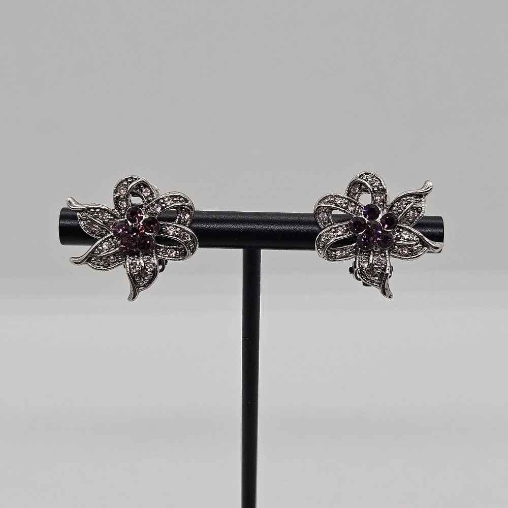 silver tone and purple rhinestone flower clip earrings